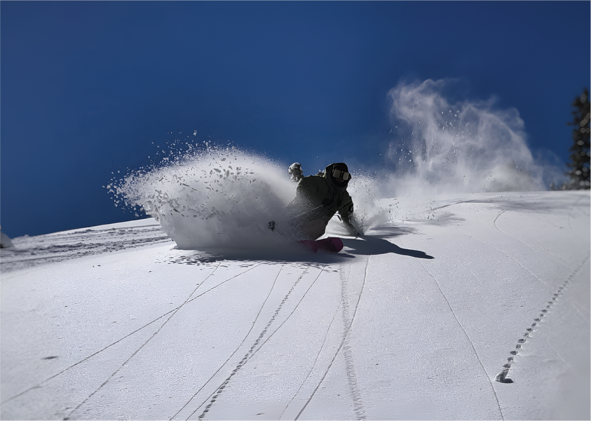 Skier riding Liberty Genome skis on snow
