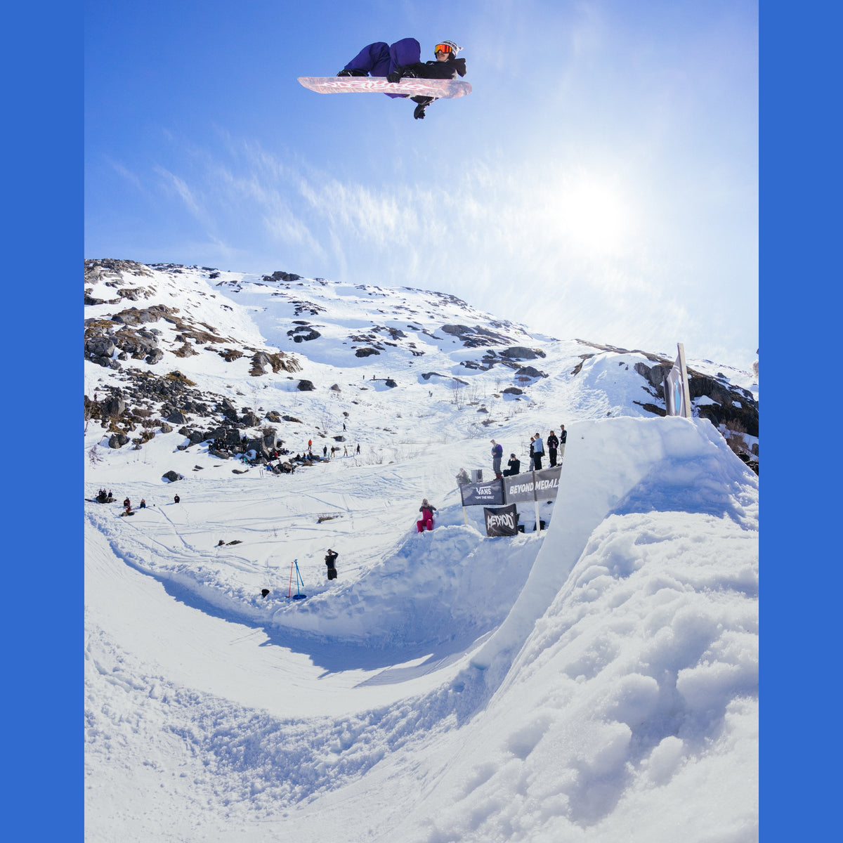 Bataleon Stereo Team Snowboard 2026/27 — rider grabbing the board in a jump