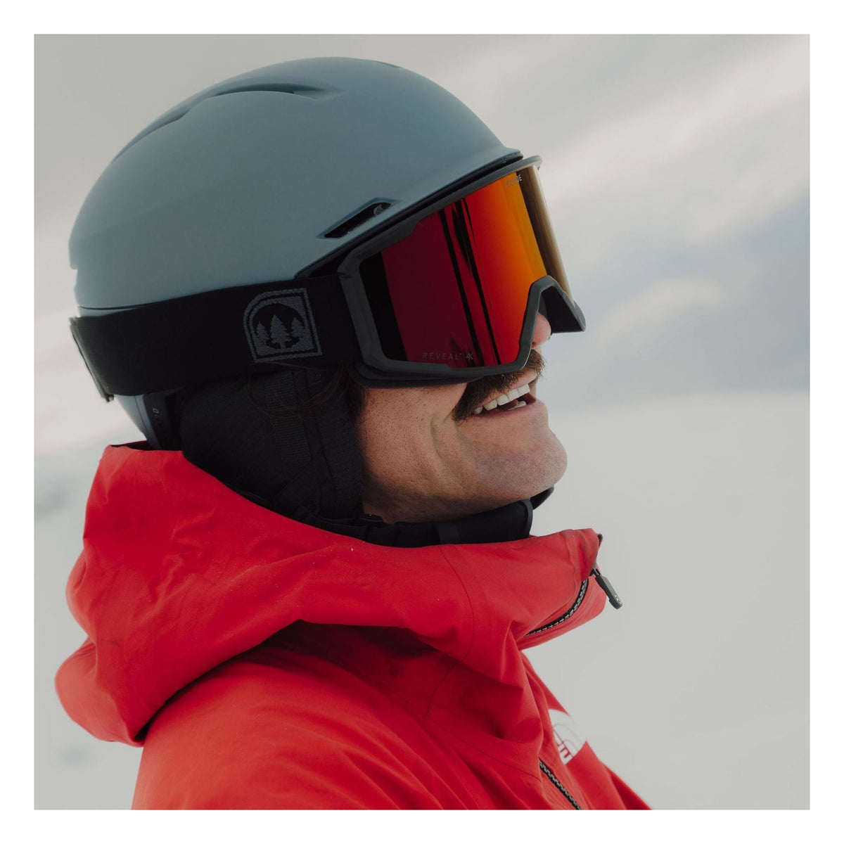 Glade Divide Ski & Snowboard Goggles 2026/27 Matte Black / Blood Orange lifestyle photo