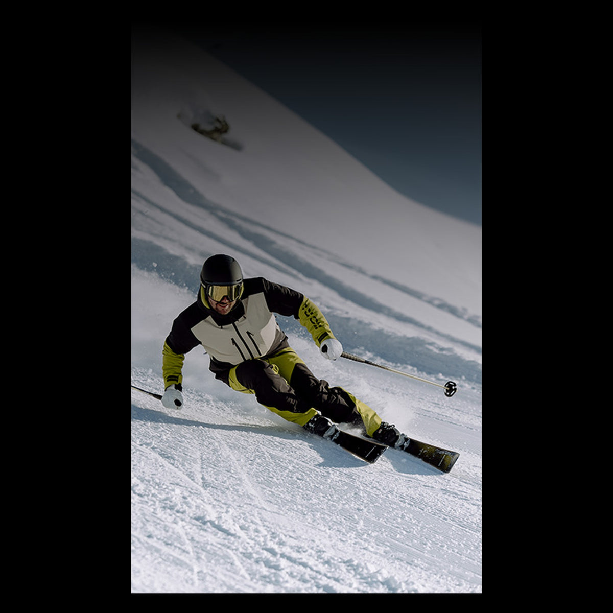 Tyrolia Attack 14 GW — skier carving on snow